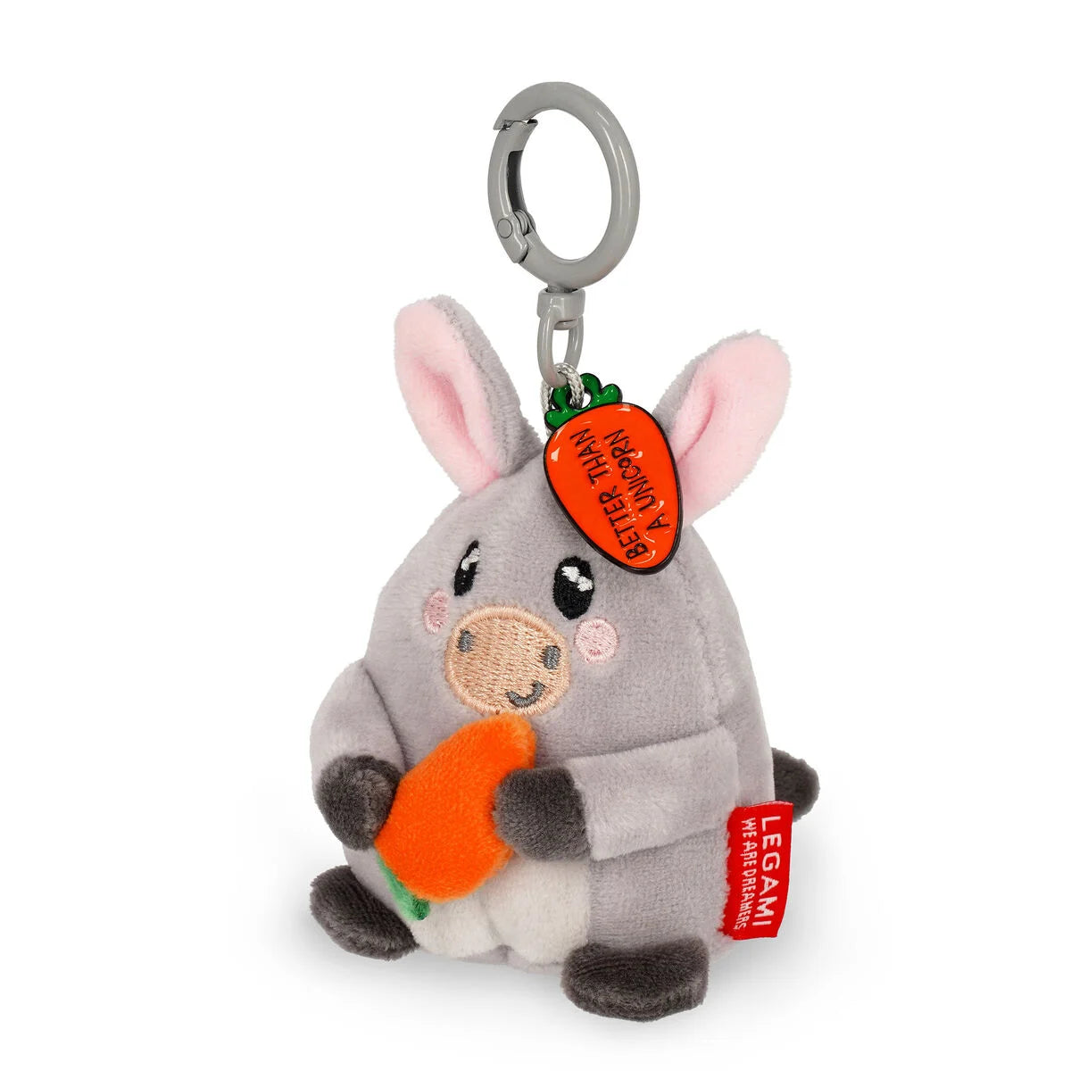 Plush keychain of a gray animal holding a carrot on a white background