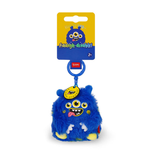 Blue monster plush key ring on a white background