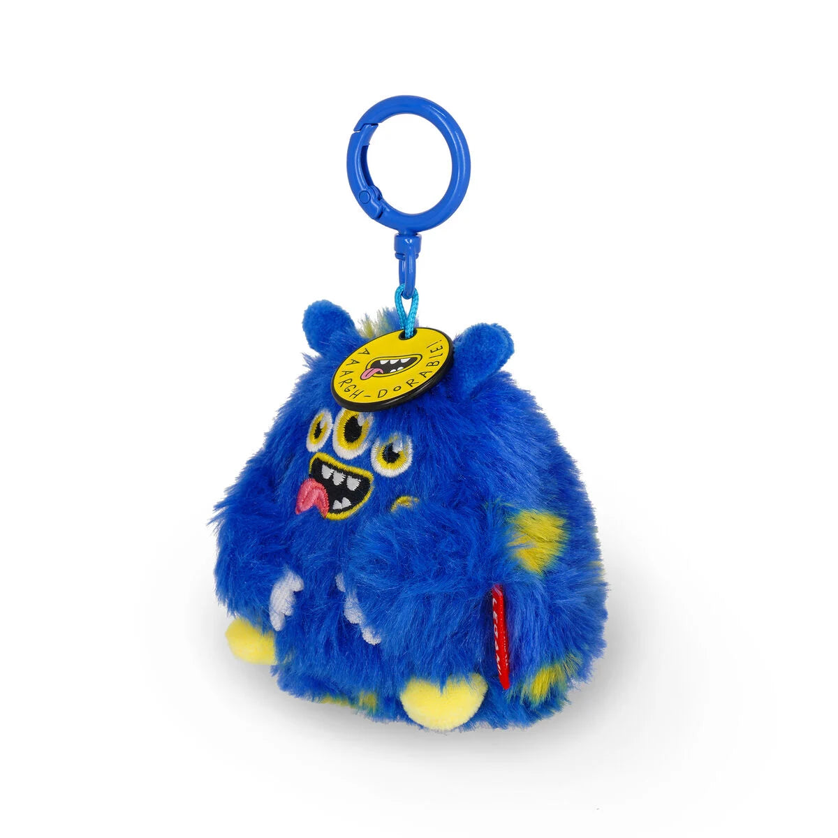 Blue fluffy monster keychain with a tag on a white background